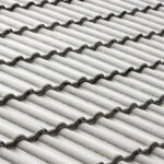 Closeup grey roof tiles, background, full frame horizontal composition